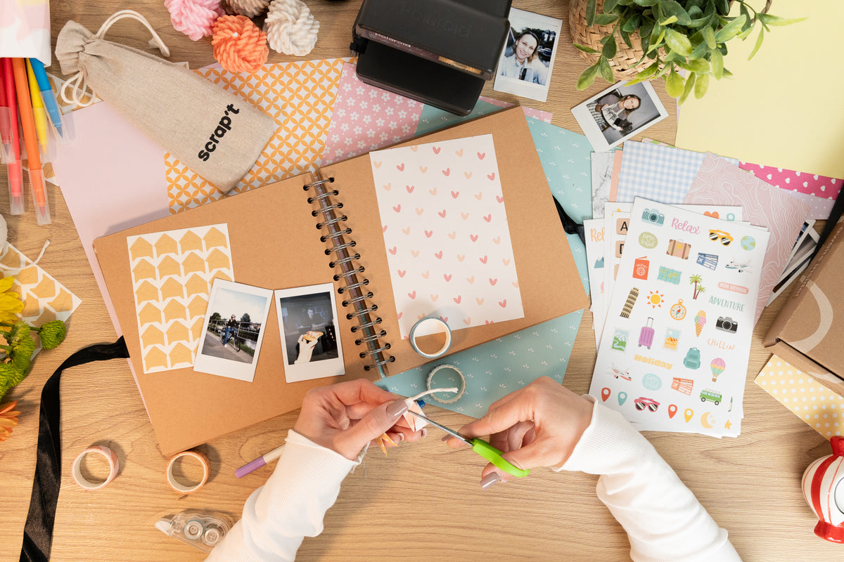 Open scrapbook with completed spread